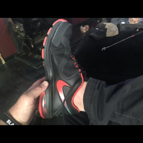 Nike Other - dope! Nike - Black and Red sneakers ..used easy.
